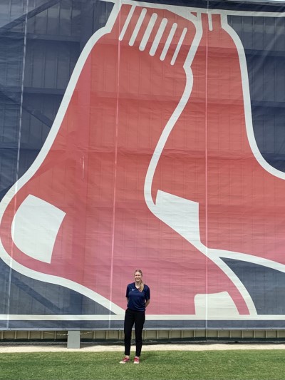 Dr. Borgstrom under a giant Red Sox banner.