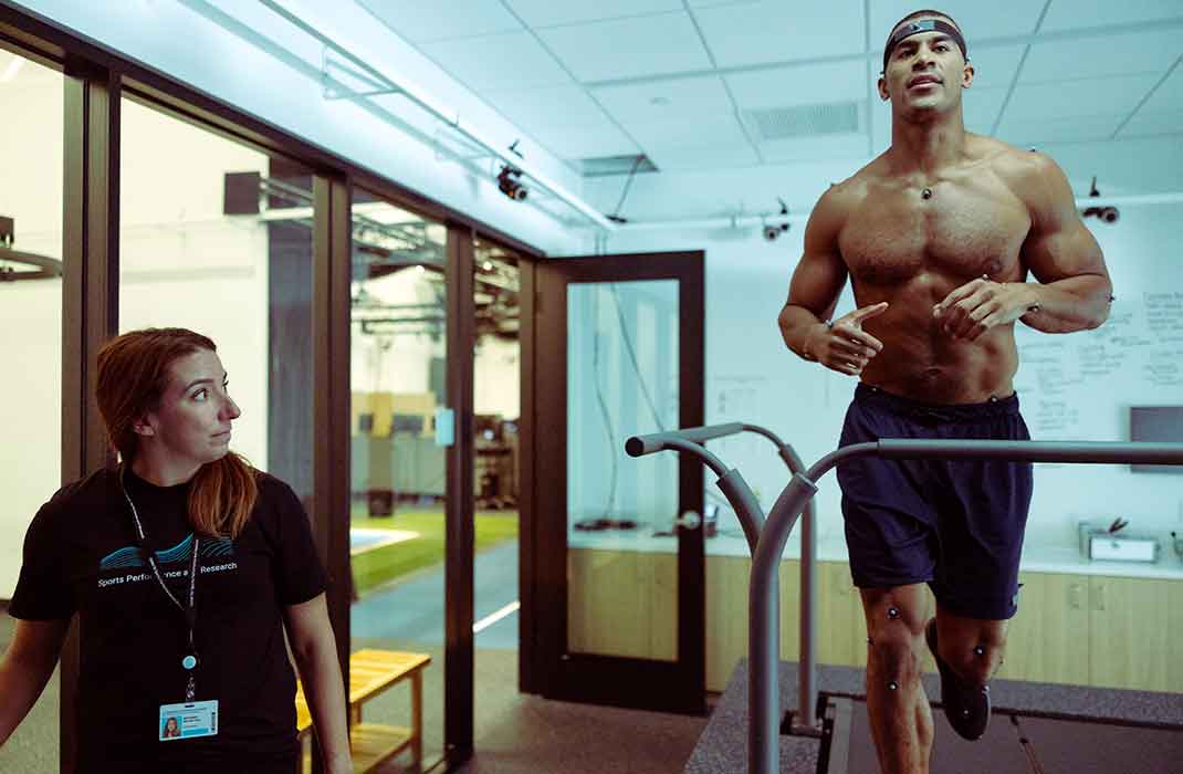 male athlete on treadmill undergoing a running assessment