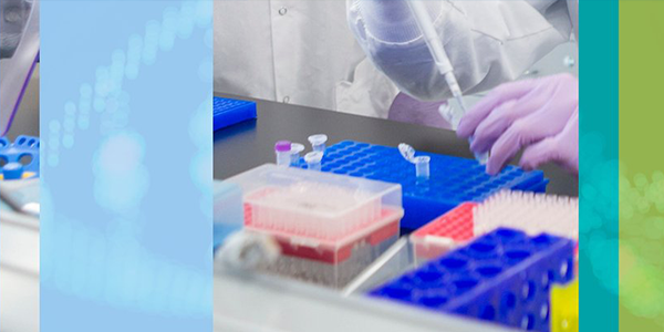 researcher pipetting samples in lab