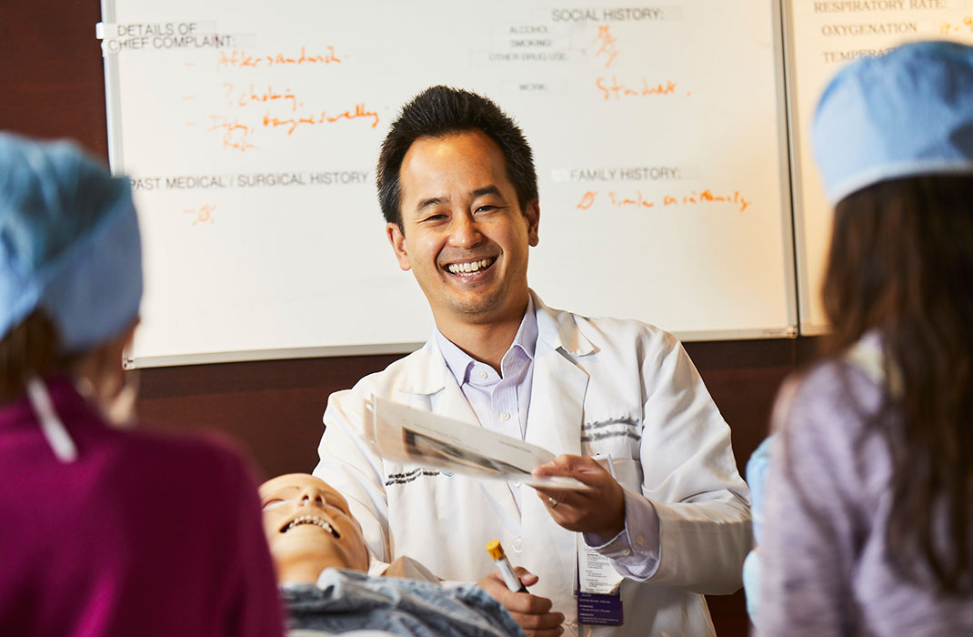 doctor smiling in medical school setting