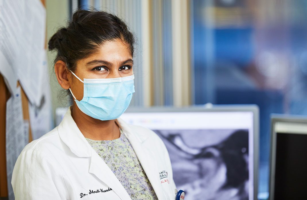female provider with mask