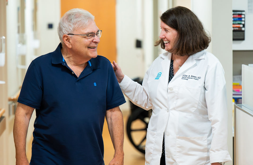 Alisa B. Rosen, MD with a patient