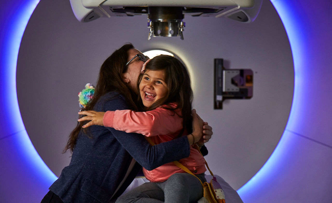 Dr. Torunn Yock with pediatric patient at Cancer Center Proton Center 