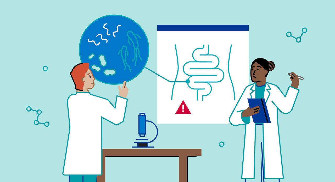 An illustration of two doctors viewing and discussing research of gut microbiome
