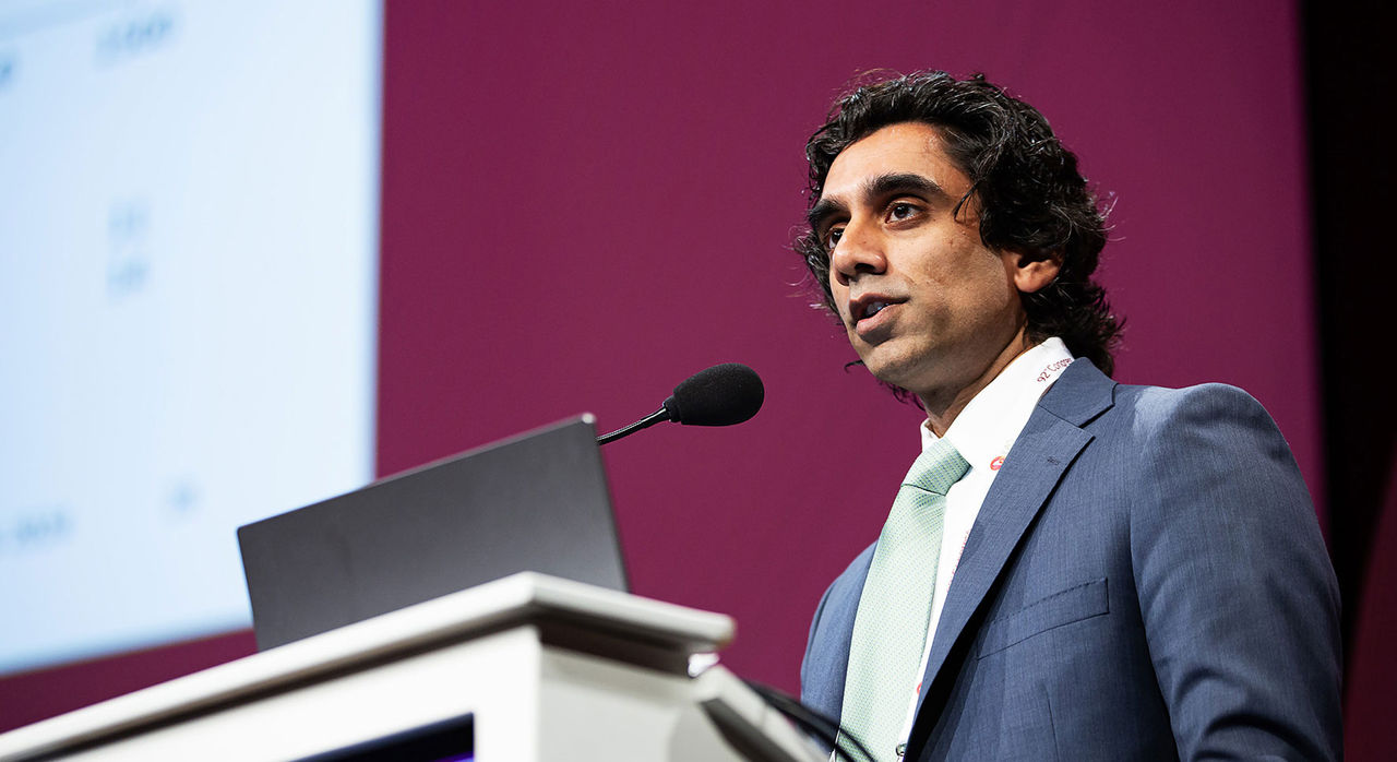 Pradeep Nataranjan speaking at a conference.