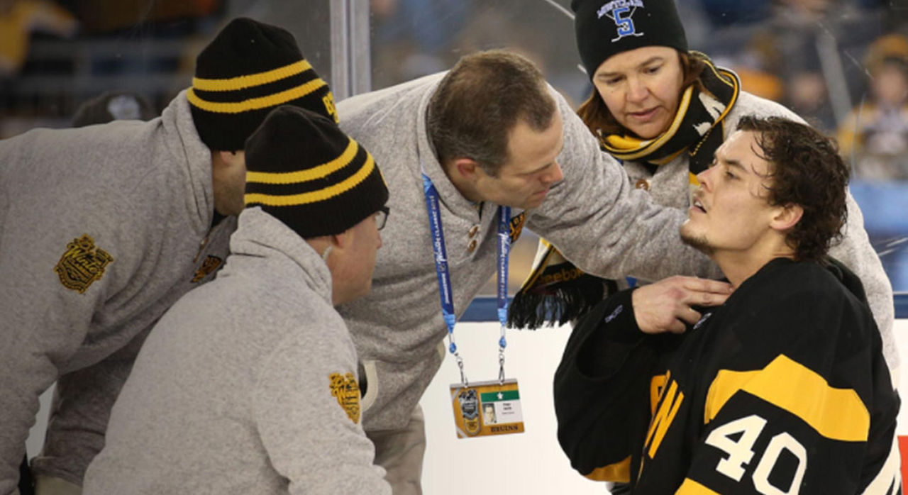 sports medicine team caring for Boston Bruins player during playoffs