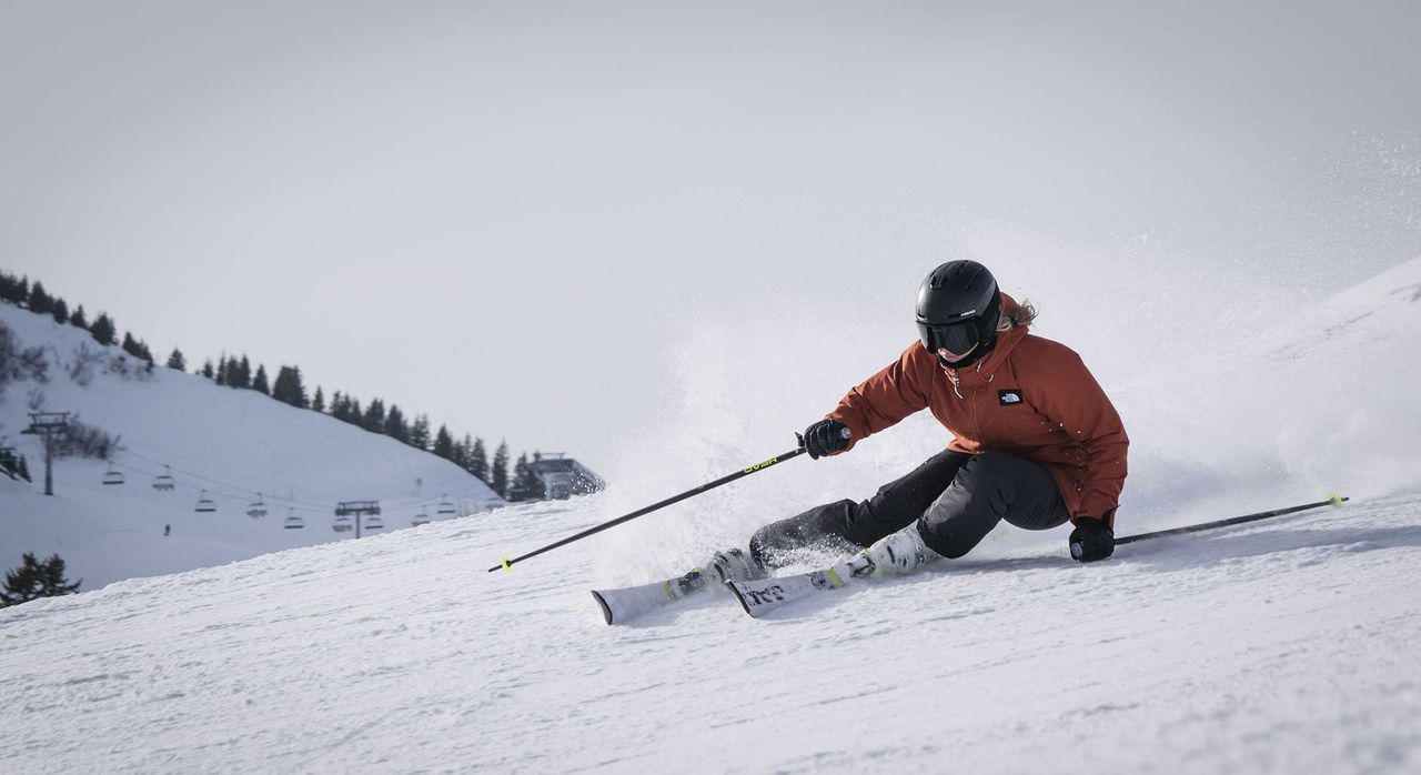 Female downhill skiier