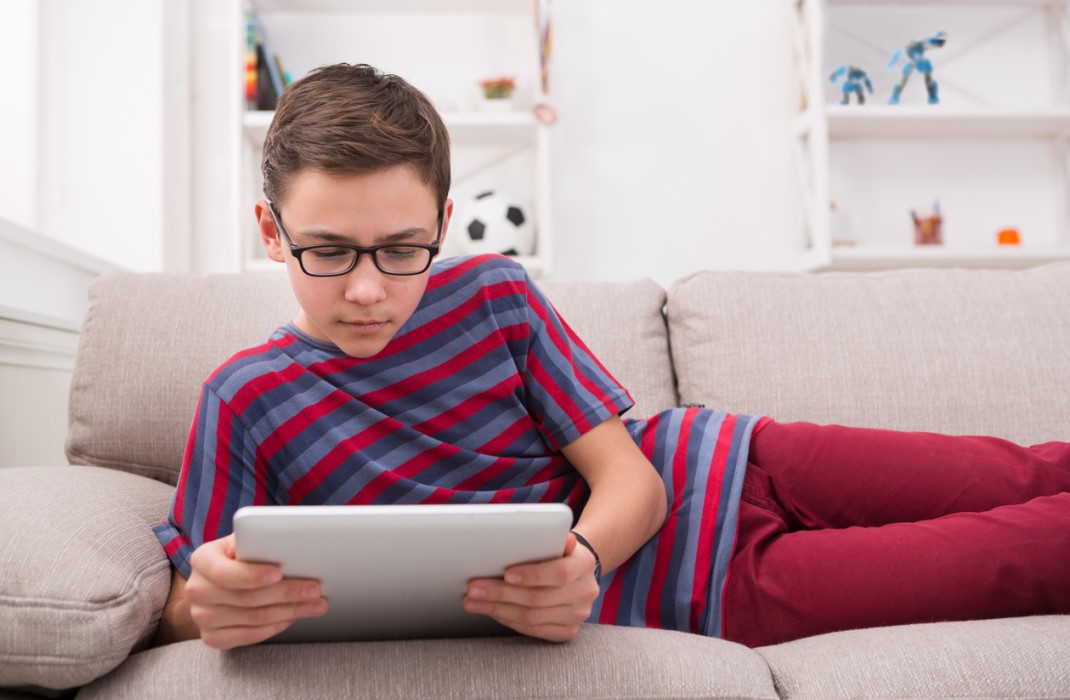 Child looking at a tablet
