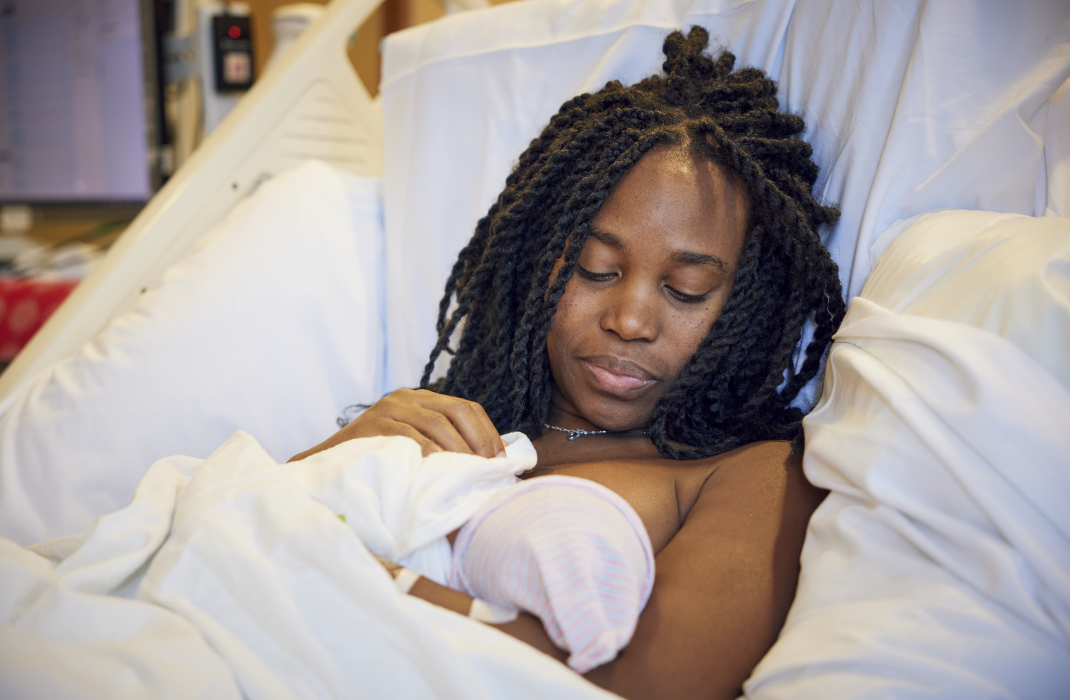 Pregnant patient and newborn baby in hospital