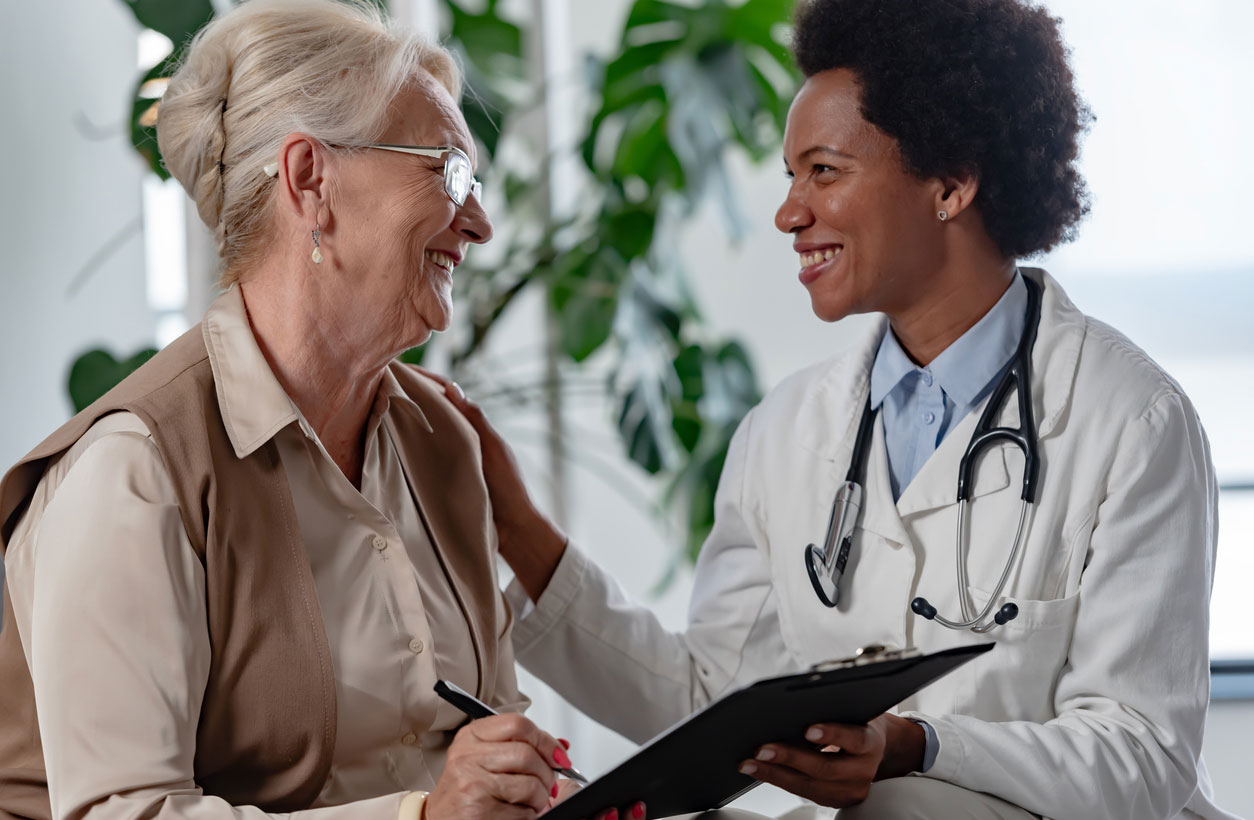 Doctor and patient with epilepsy discuss memory loss.