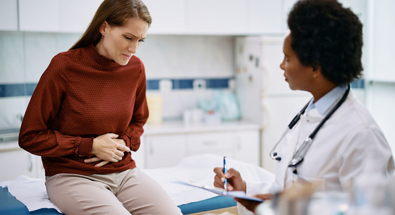 Woman with stomachache visits doctor