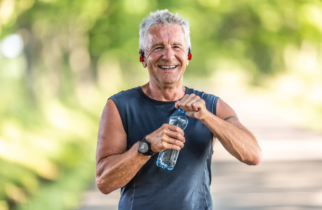 Man running with water bottle