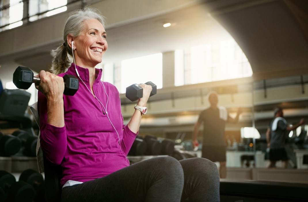 Woman strength training for heart health