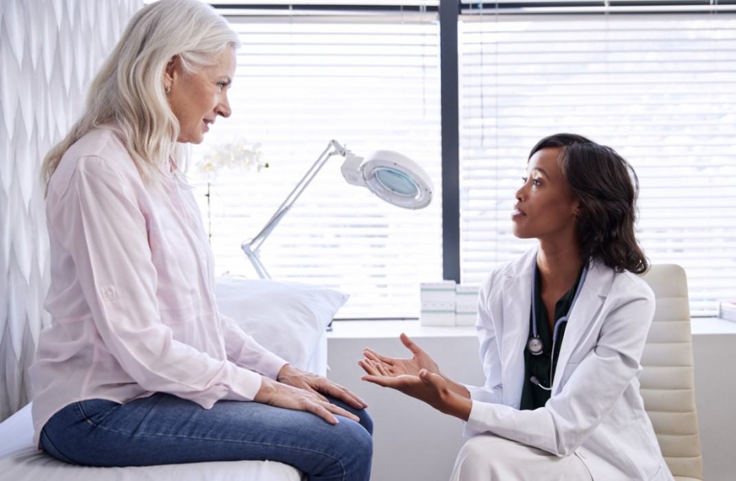 Hemorrhagic  stroke patient meets with doctor.