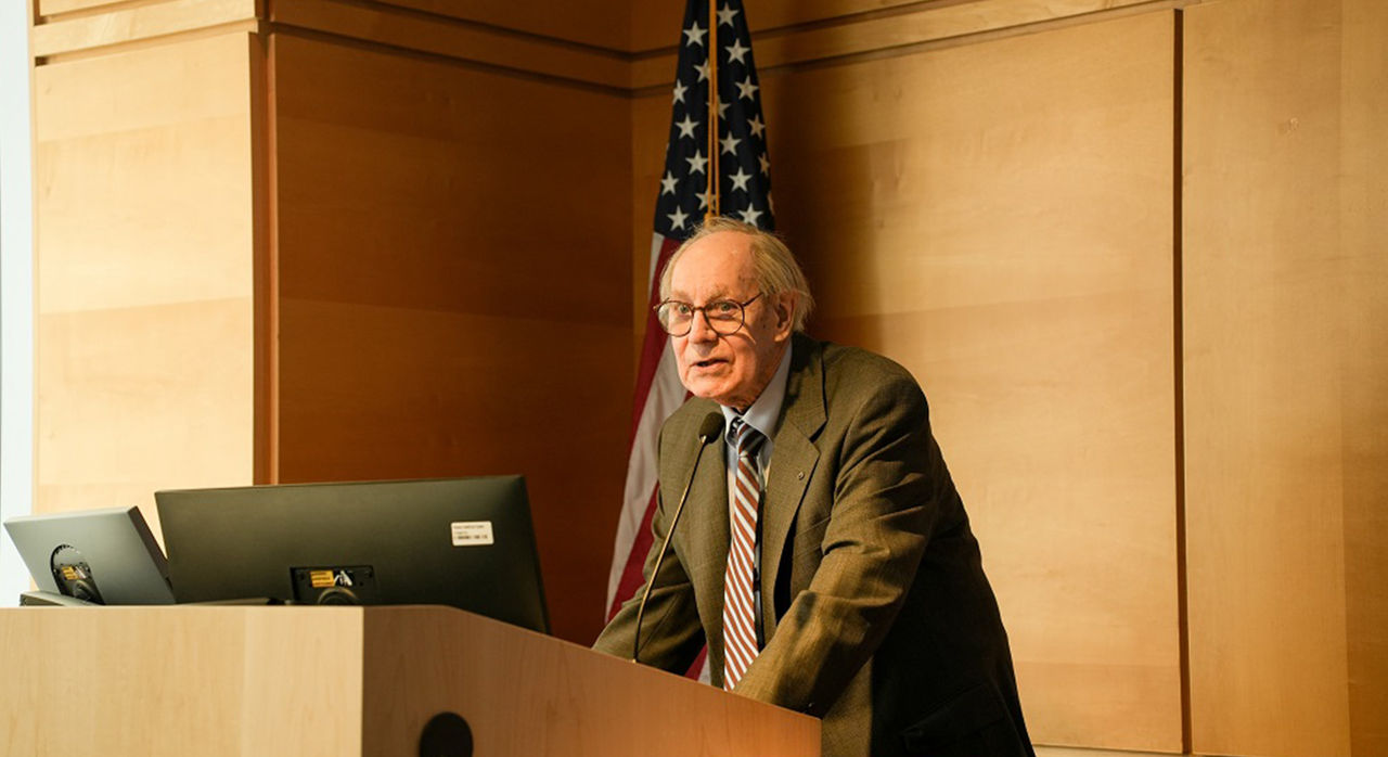 A doctor delivers a lecture