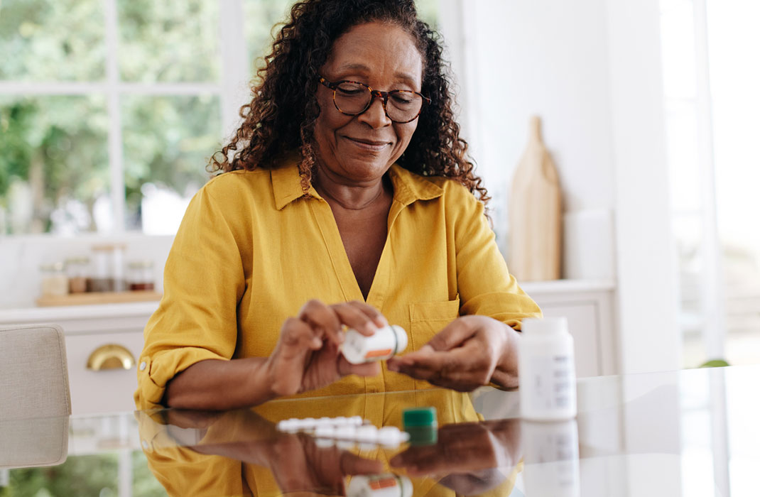 Woman takes antiseizure medicine for epilepsy.