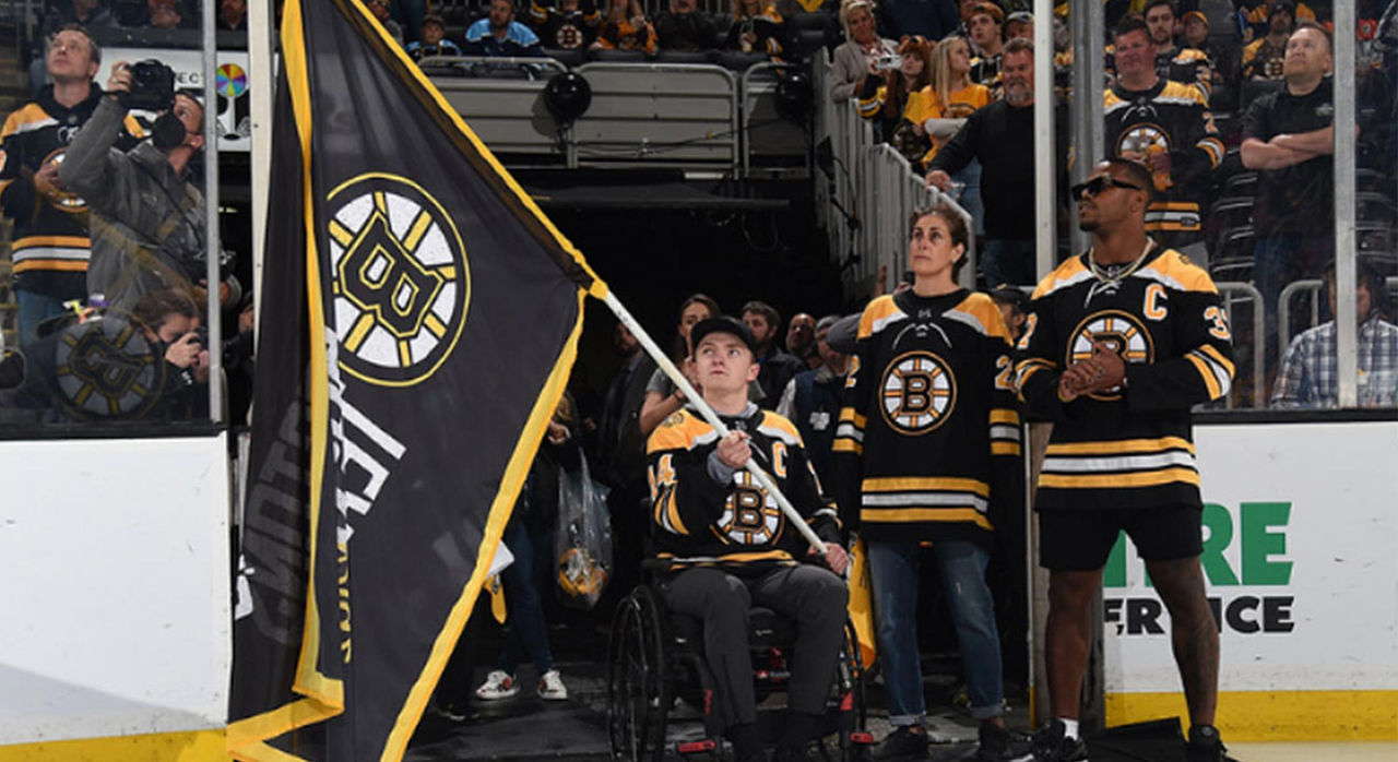 Margaret-Ann Azzaro, DNP, Cooley Dickinson Hospital, as Boston Bruins banner captain for game 3 in 2022 playoffs