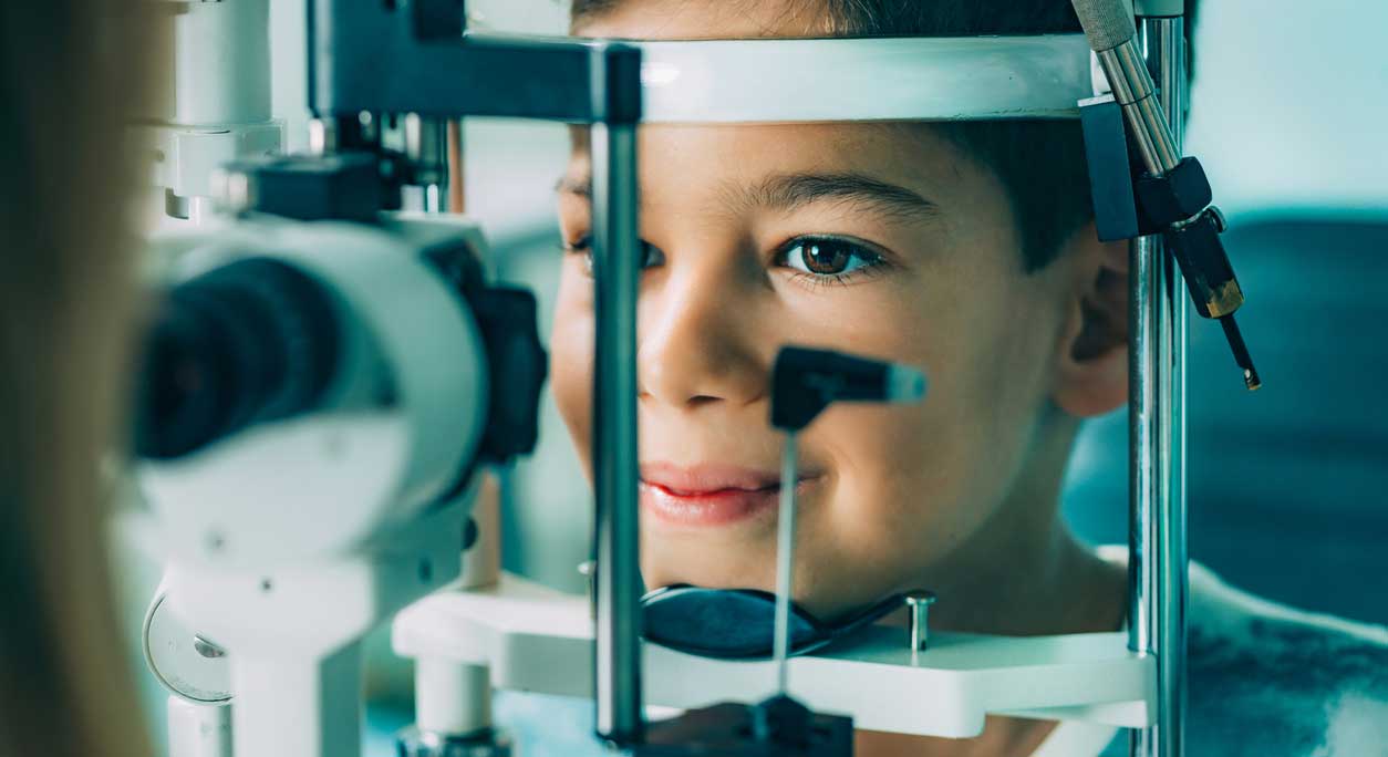 Young girl having eye exam