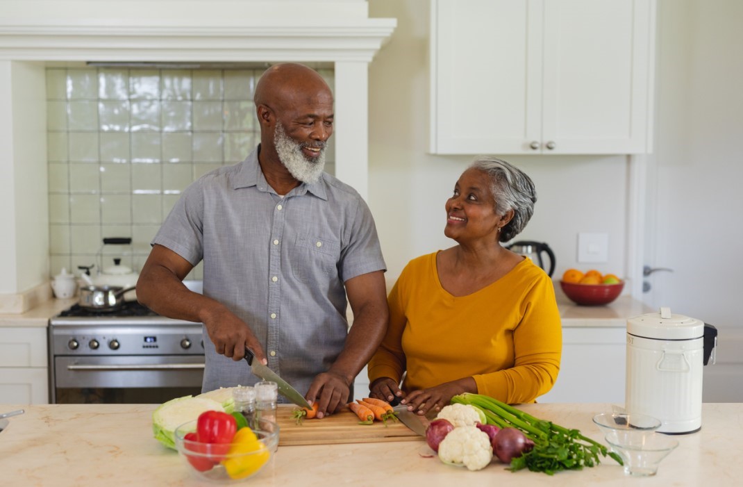 Couple cooking a heart-healthy meal in the kitchen