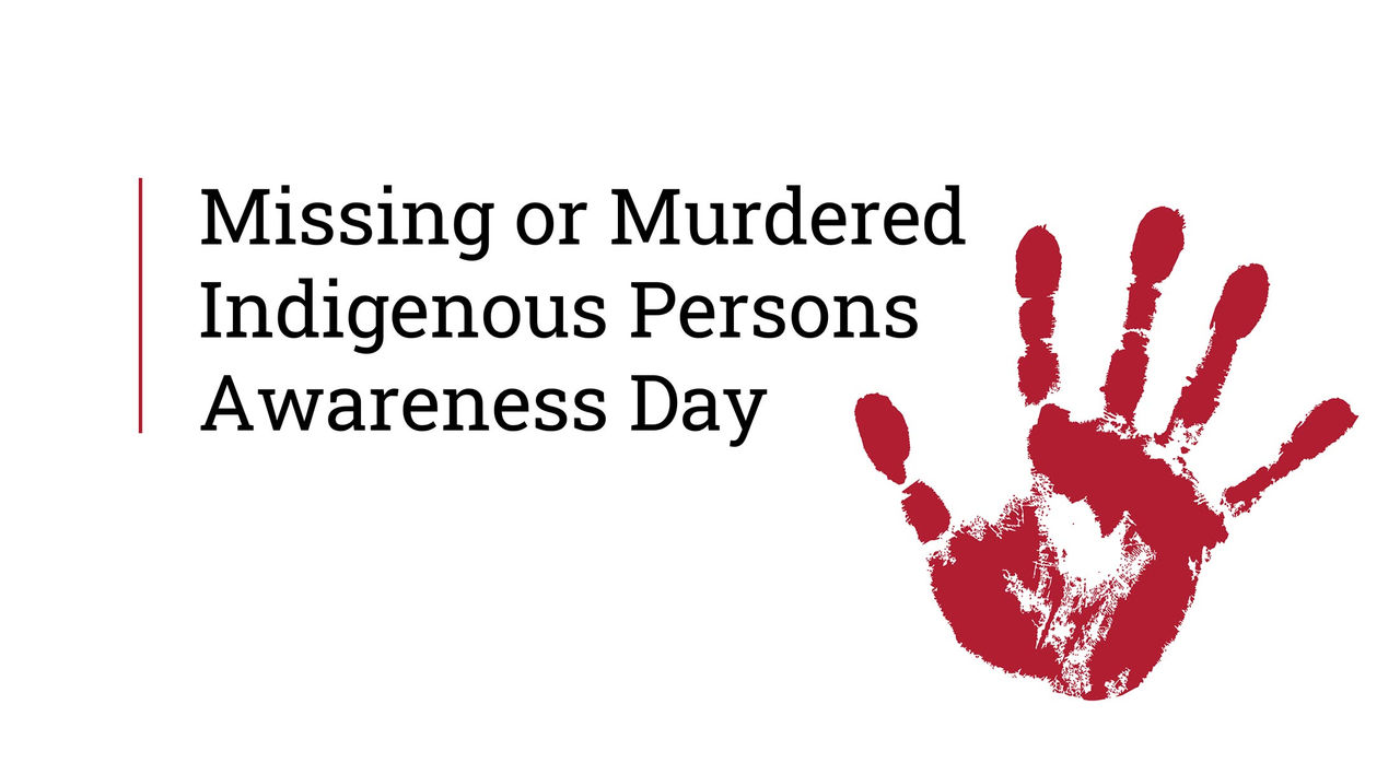 A logo with the text "Missing or Murdered Indigenous Persons Awareness Day" with a right handprint in red