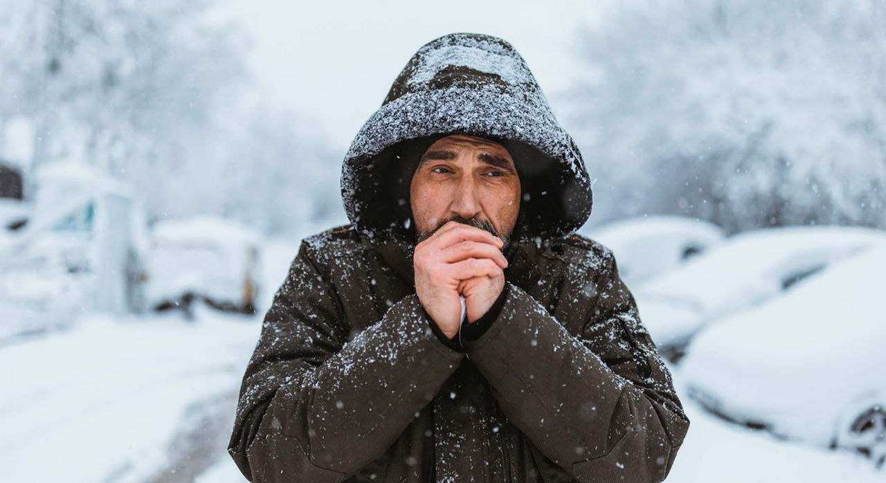 Man outdoors in winter setting