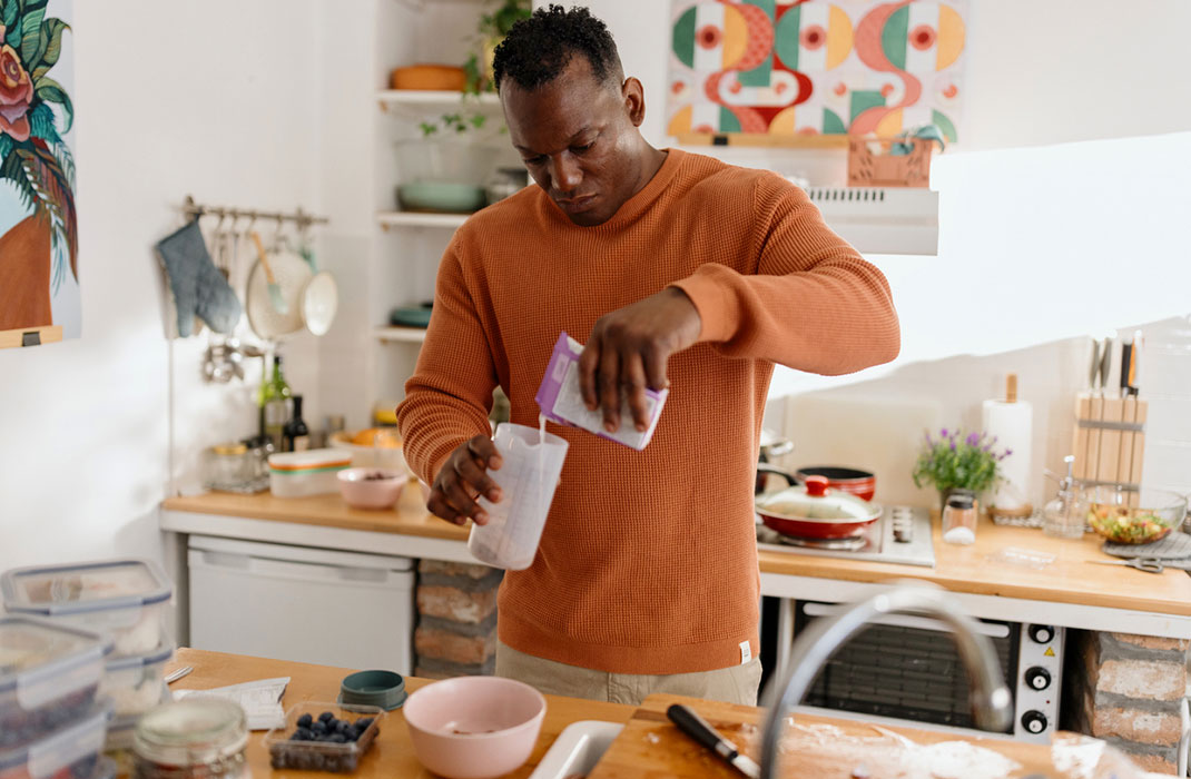 A male athlete enjoys a nutritious diet.