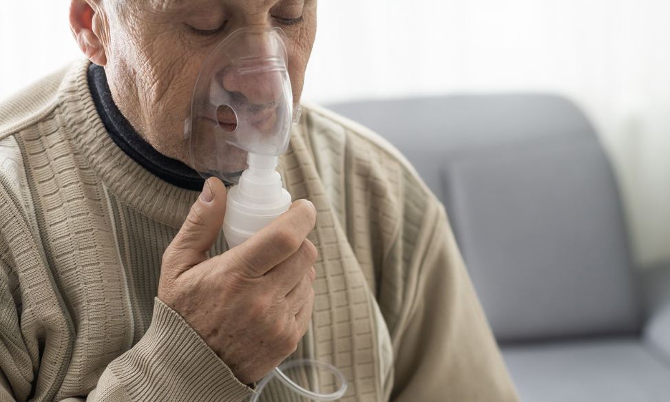man with COPD using an oxygen mask