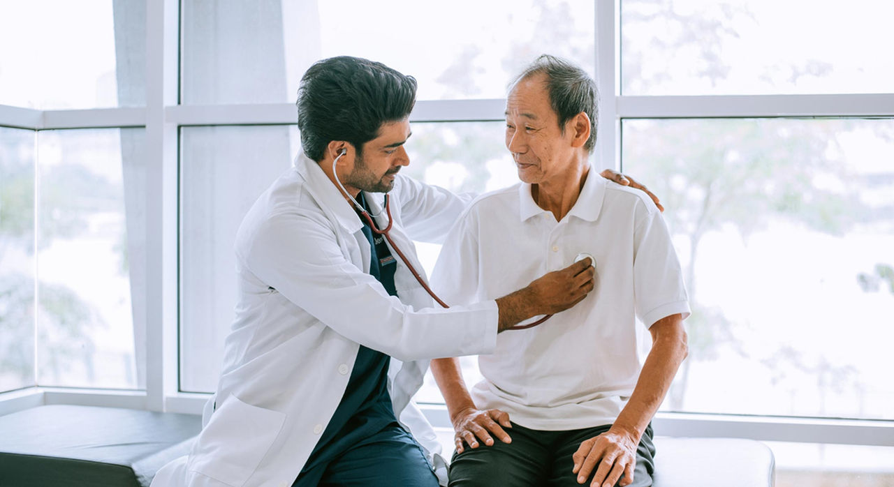 Doctor listening to Afib patient’s heartbeat