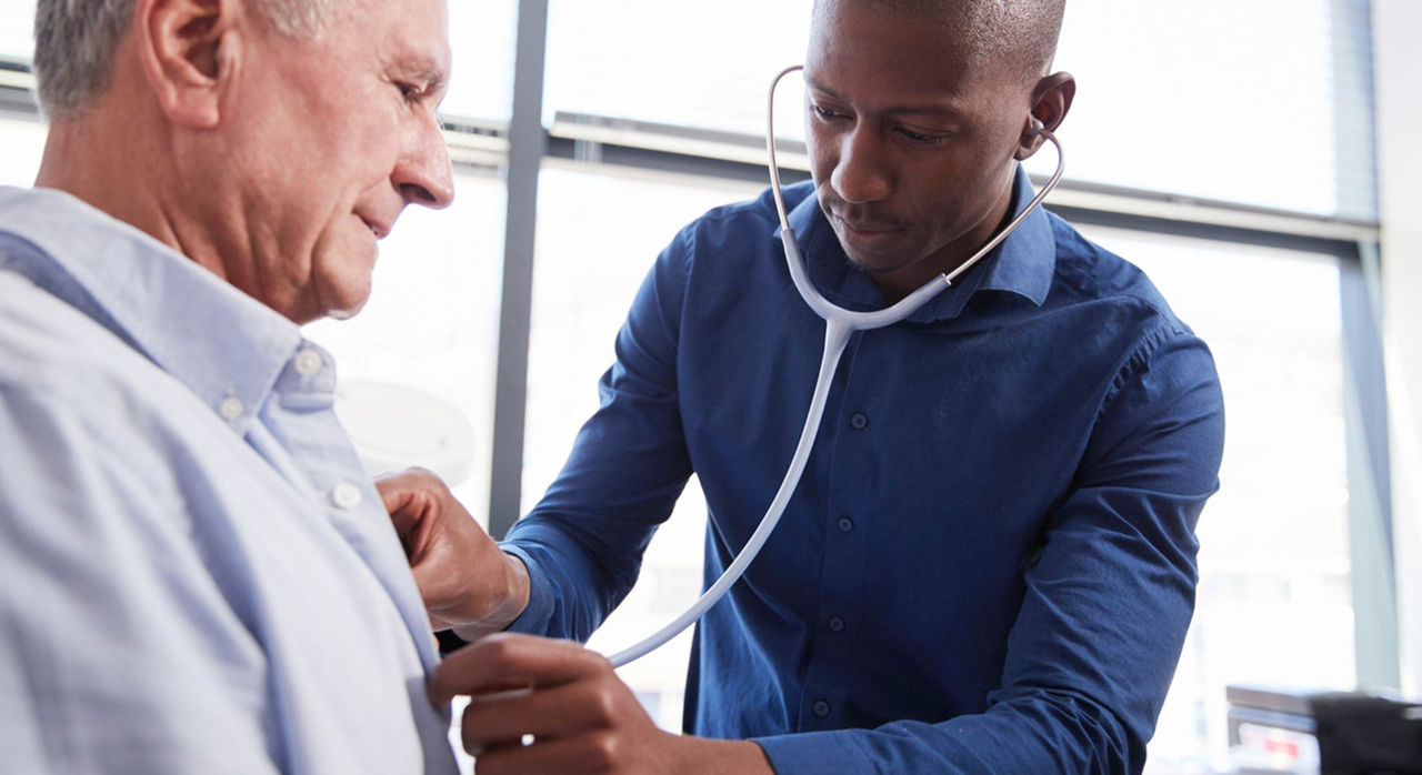 Electrophysiologist checks patient’s heartbeat