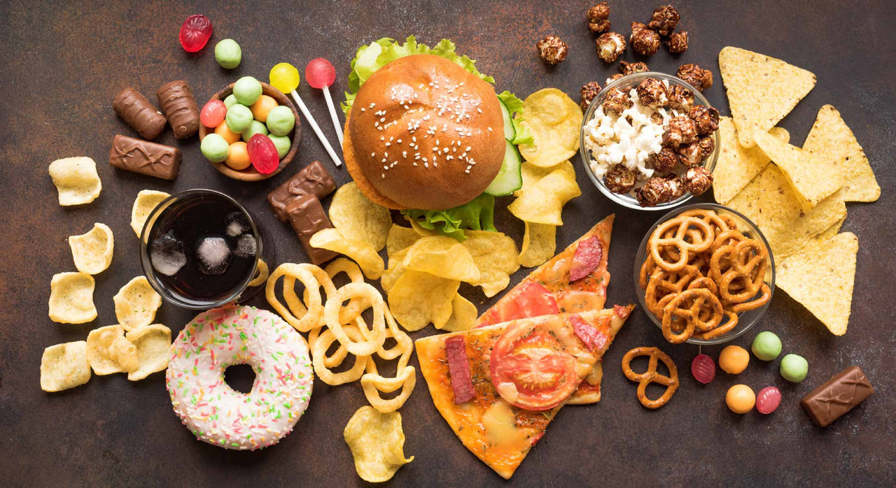 A spread of fatty foods that can raise cholesterol