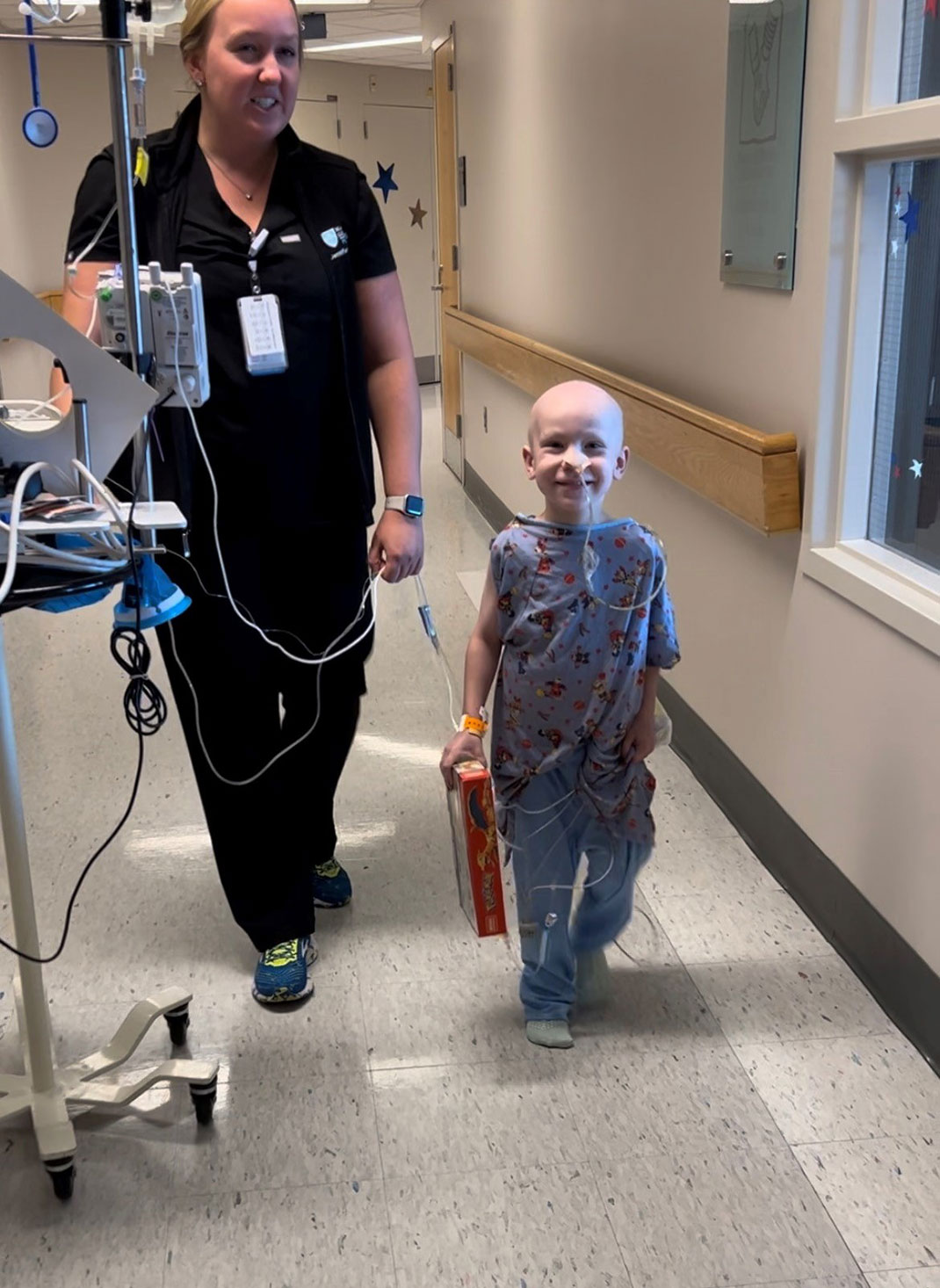 Theo’s first walk with a physical therapist after his tumor resection surgery in August 2023