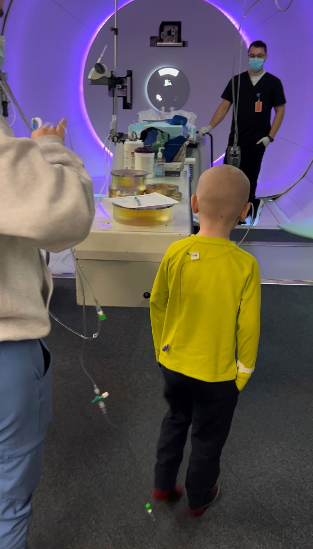 Theo entering proton radiation therapy in February 2024