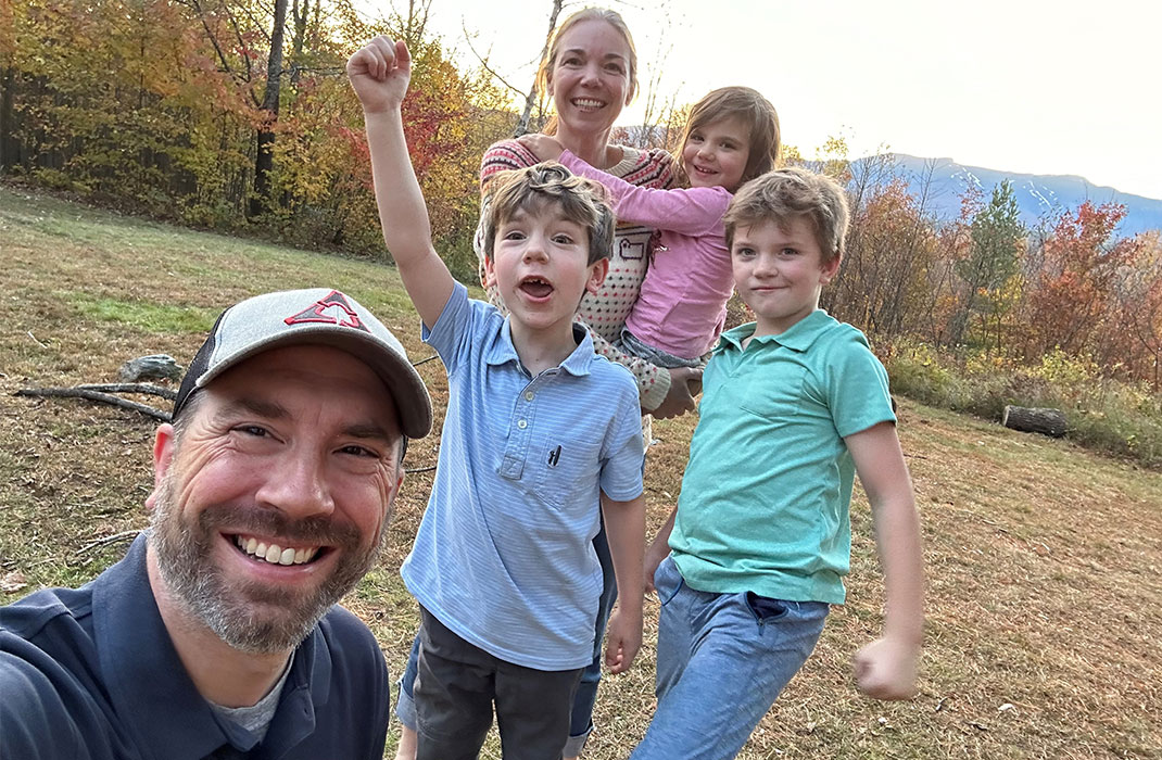 Theo with his family on a trip in Vermont in October 2024