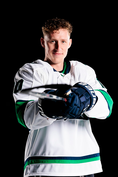Jack posing in his hockey gear and attire.