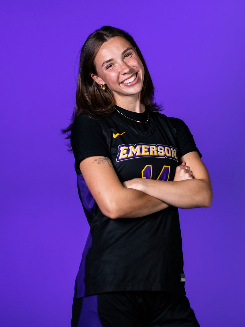 Kaylin posing in her basketball uniform.