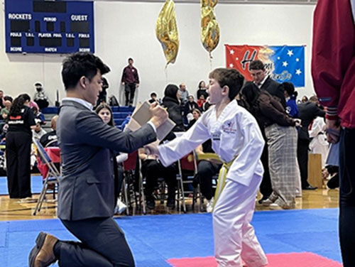 Liam practicing taekwondo.