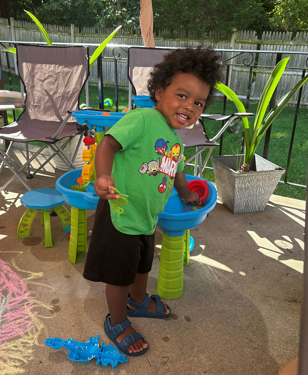 Toddler Lamar Carter Jr. playing outside
