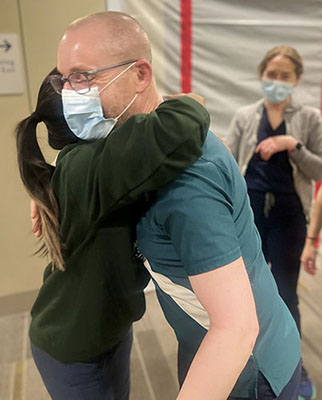 Cory with some of his care team. 