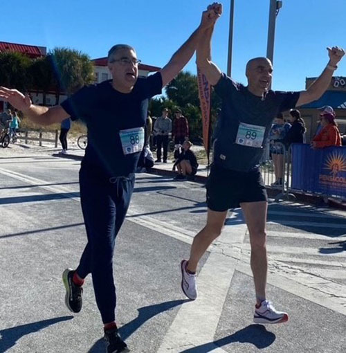 Scott and Keith run the Pensacola Half Marathon together.