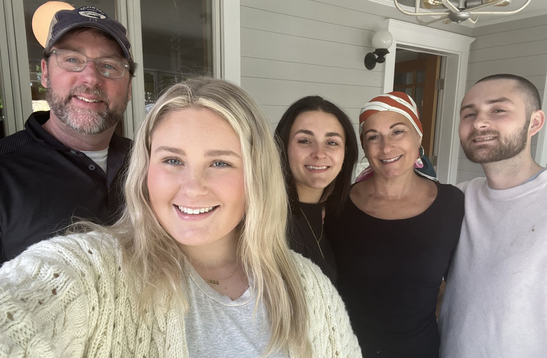 Jennifer during treatment, posing with her family 
