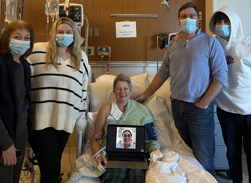 Jennifer in the hospital surrounded by family 