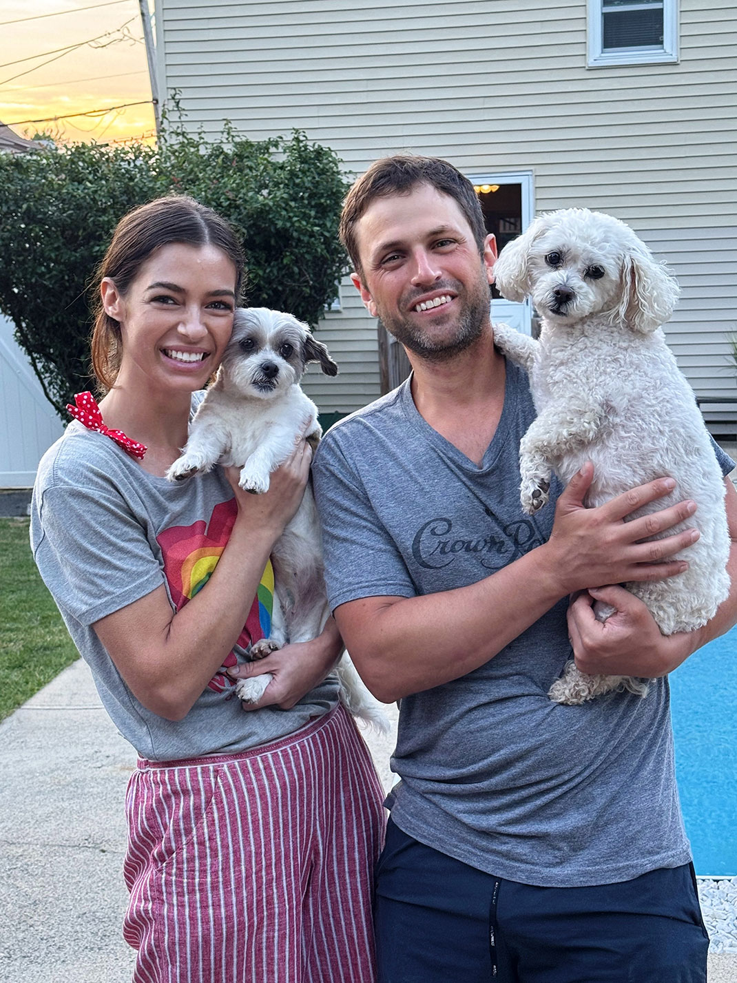 Tess with her husband and two dogs