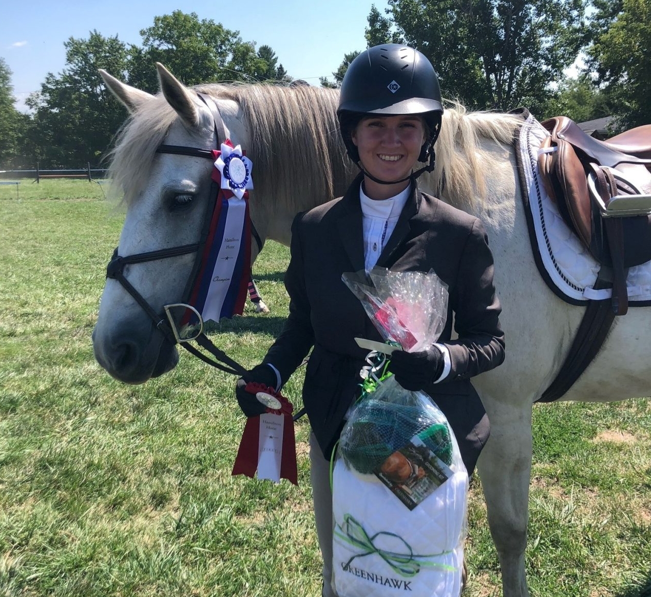 Sydney standing with her horse