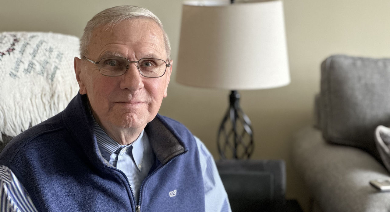 senior male at home facing camera