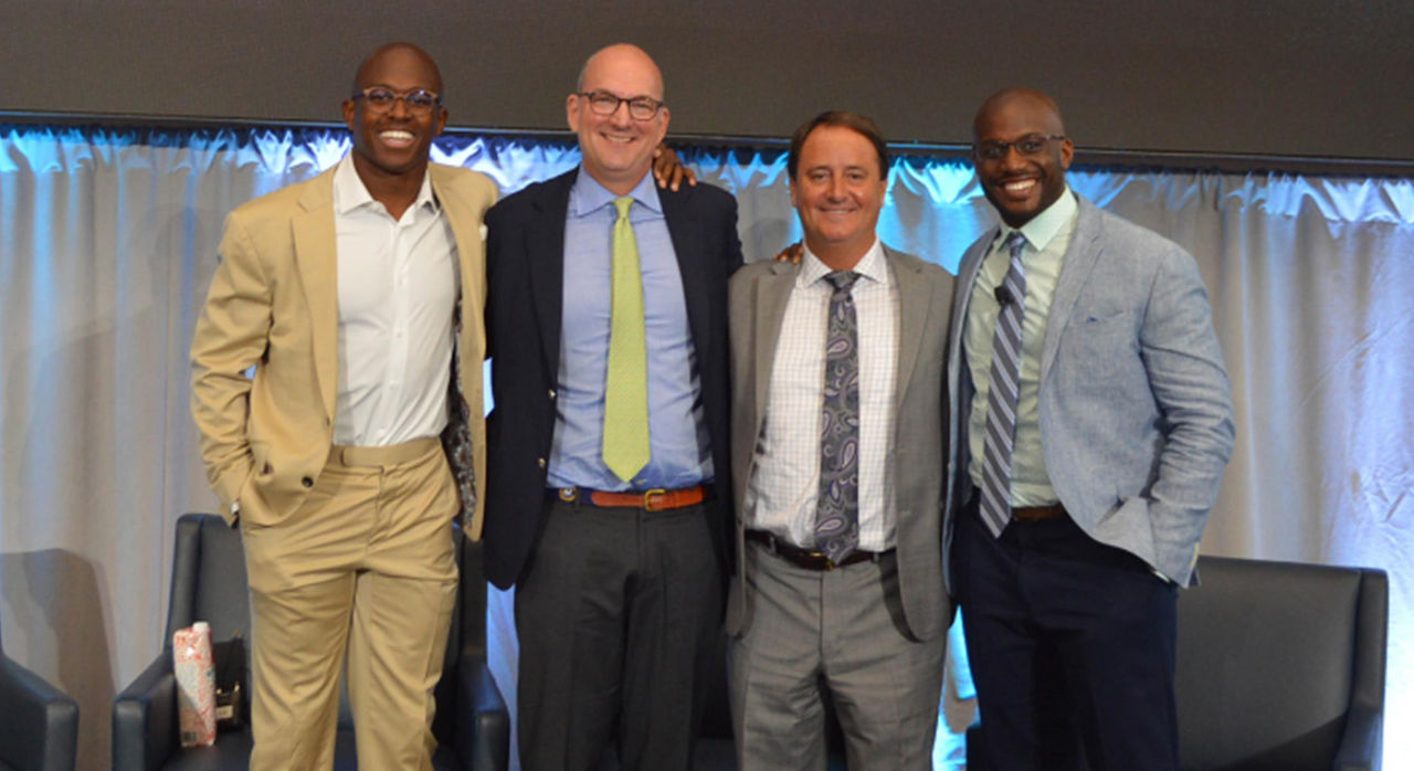 Matthew Slater, Team Captain of the Patriots; Mark Price, MD, Team Physician of the Patriots; Jim Whalen, Head Athletic Trainer of the Patriots; and Daryl Nelson, Director of Organizational Development for the Patriots