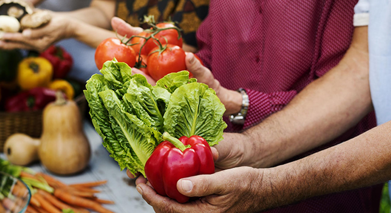 person holding vegetables