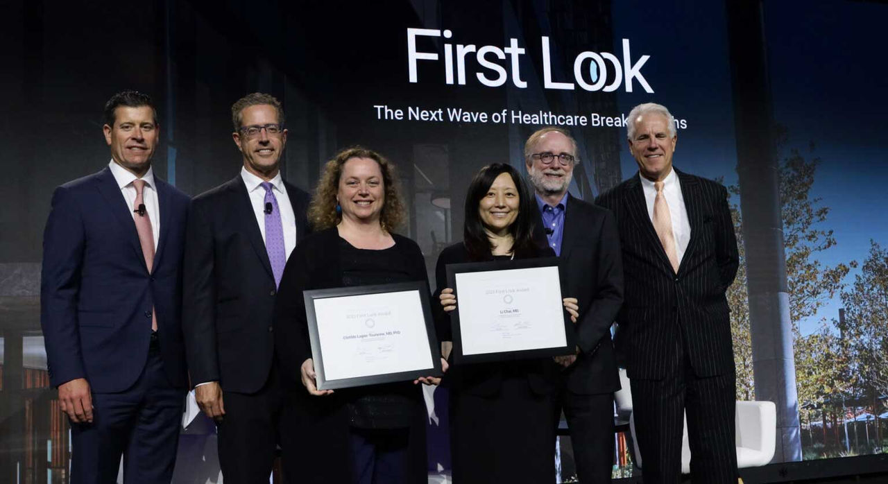 Dr. Lagier-Tourenne and Dr. Chai pose with their awards.