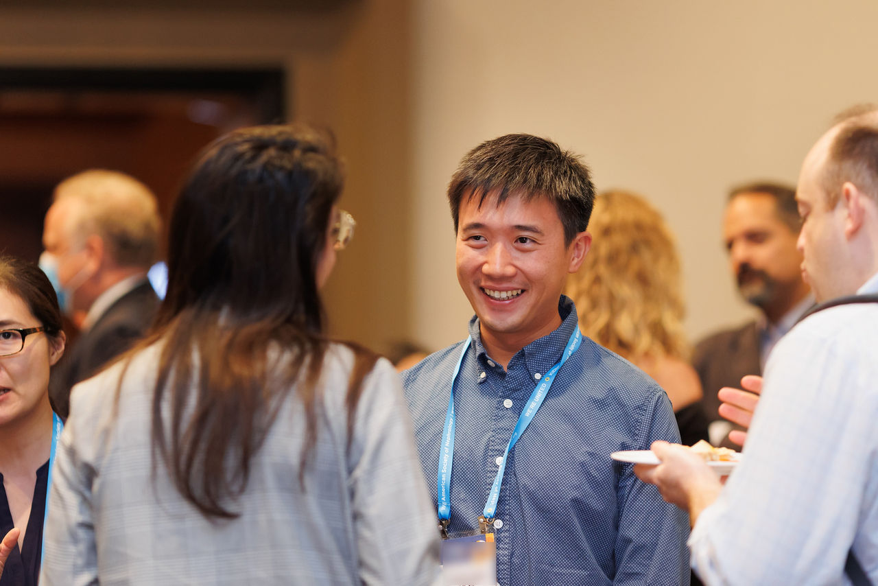 Mass General Brigham alumni socializing at a networking event