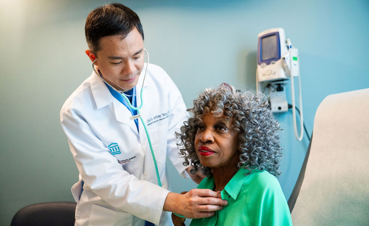 Dr. Wang with a patient