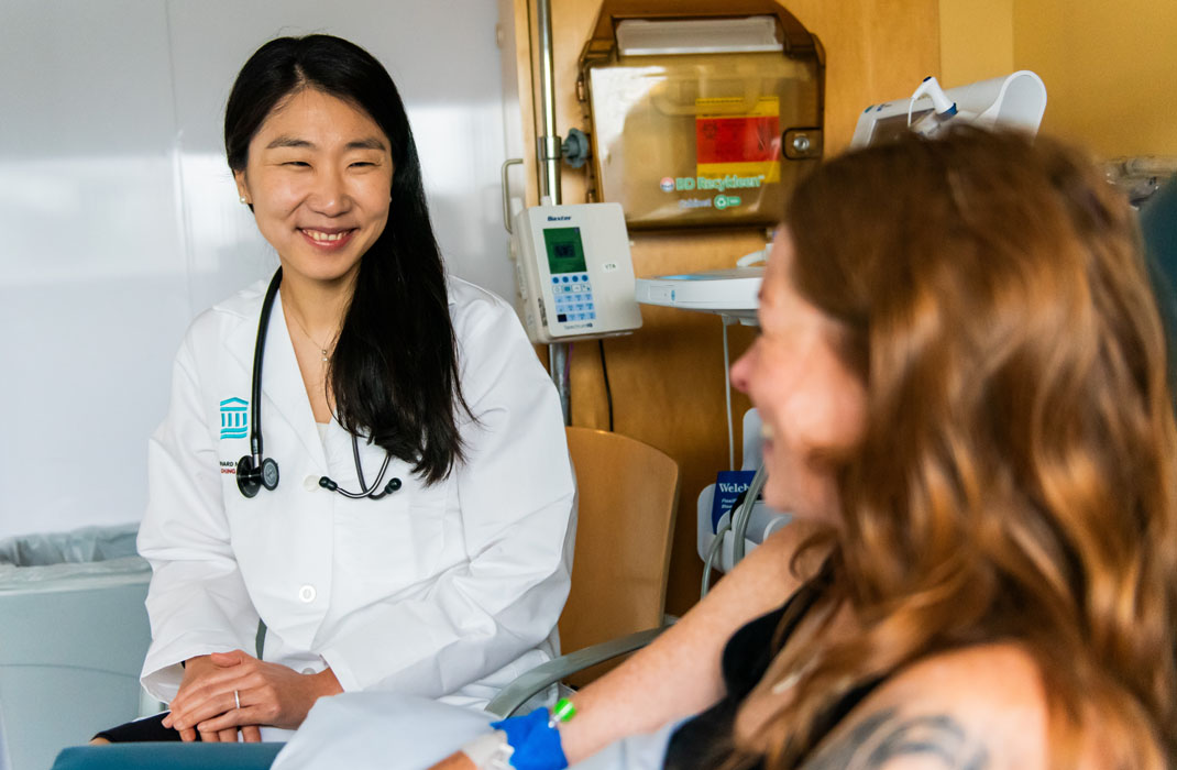 Jessica Lin, MD with a patient